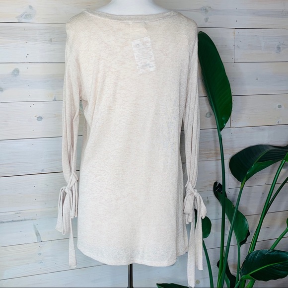 SOLD! Light Cream Colored Soft Knit Top with Cute Detailing Around Wrist - Picture 3 of 6